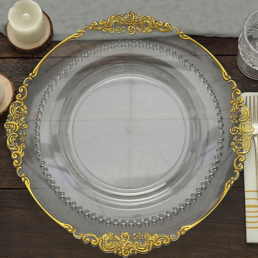 Elegant clear glass plate with gold trim and beaded detail.