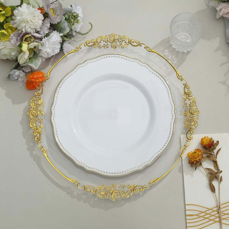 Elegant white plate with ornate gold trim, surrounded by flowers.