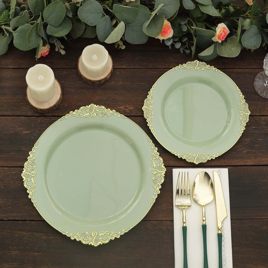 Elegant green dinner plates with gold accents and matching cutlery on a rustic wooden table.