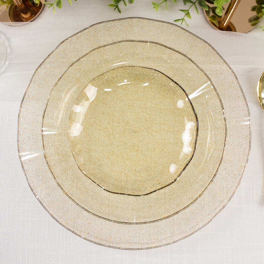 Elegant layered glass plates with a subtle gold rim detail.