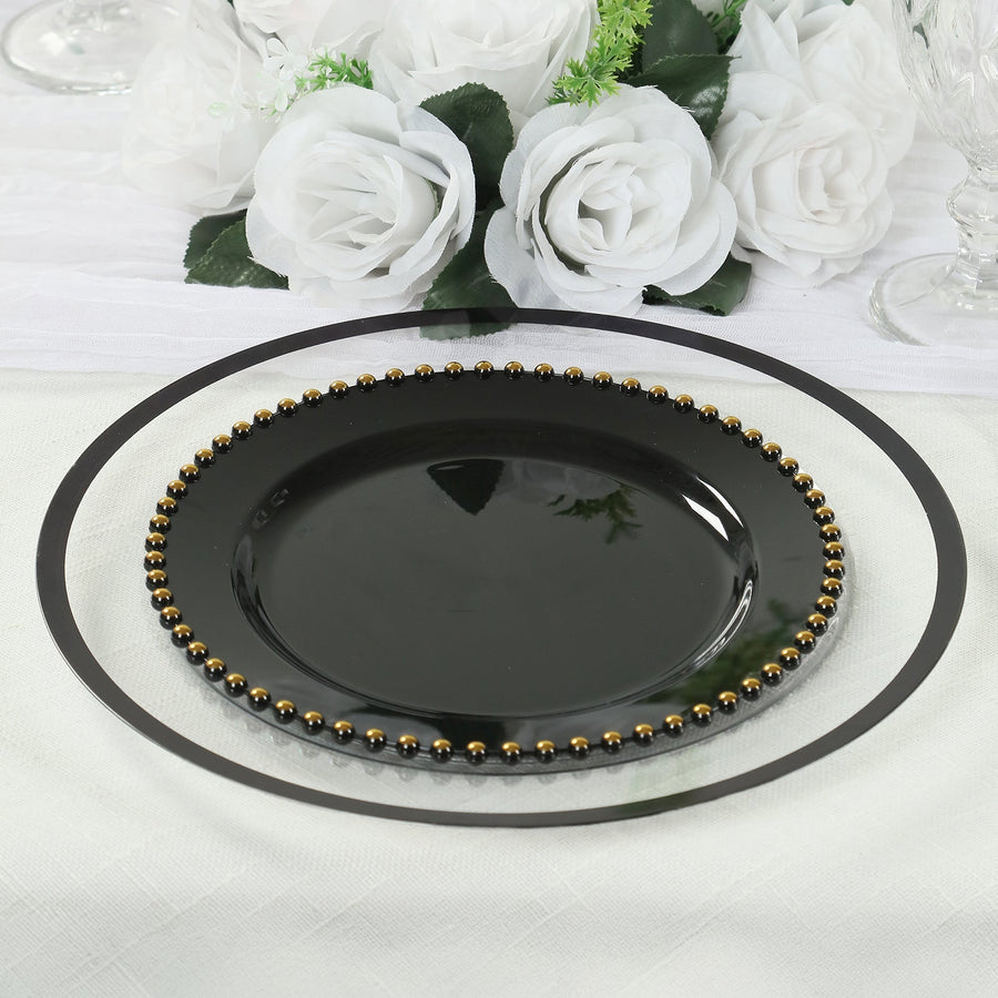 Elegant black plate with gold beading, perfect for dining decor.