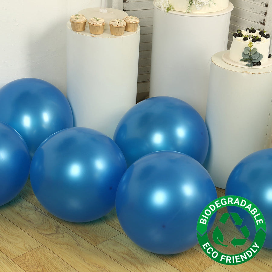 Biodegradable blue balloons on a wooden floor