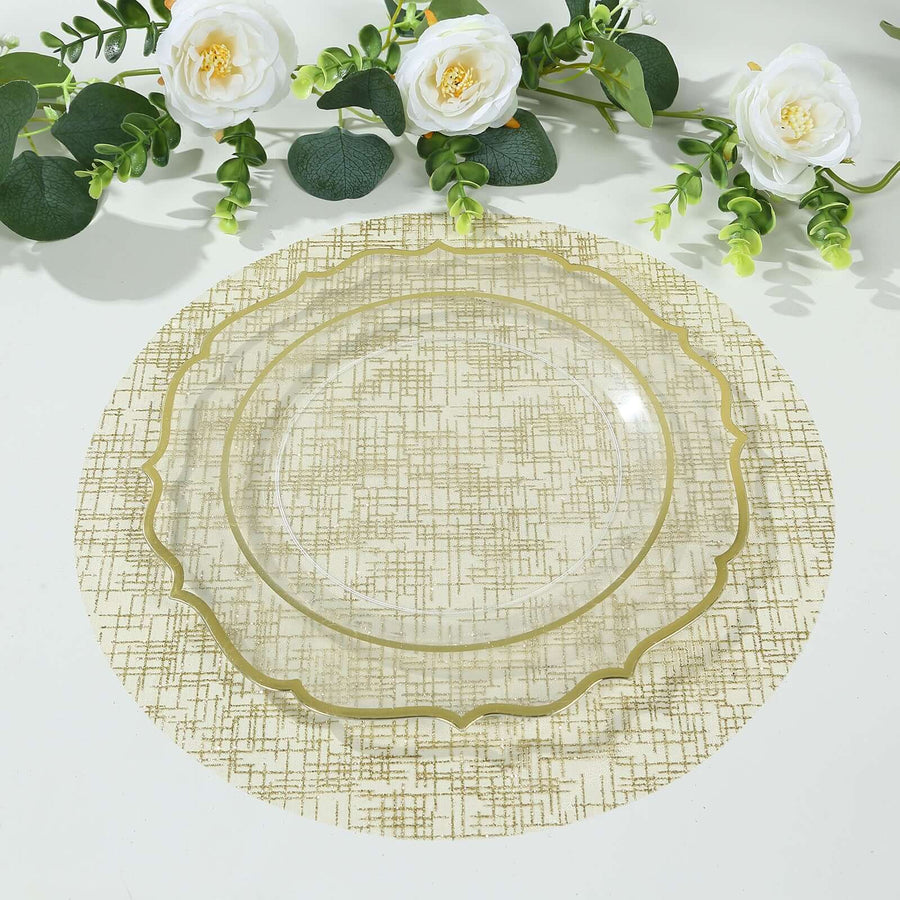Clear decorative plate on textured table mat with floral accents.