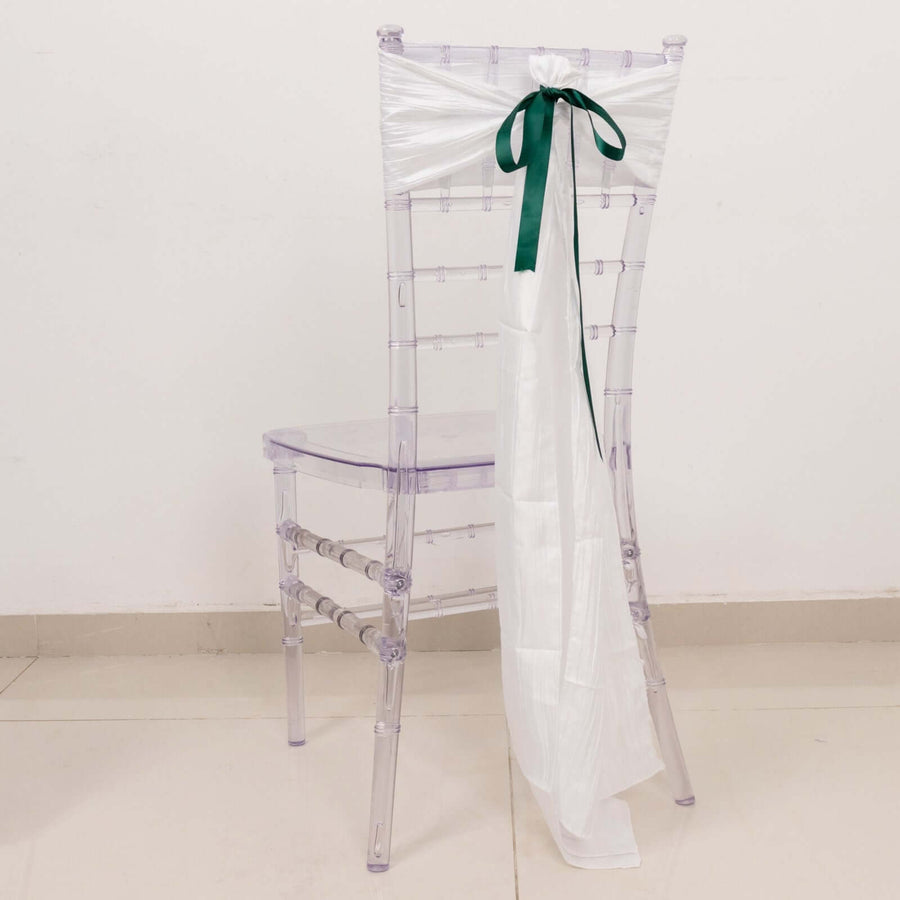 Clear acrylic chair with white and green decorative bow