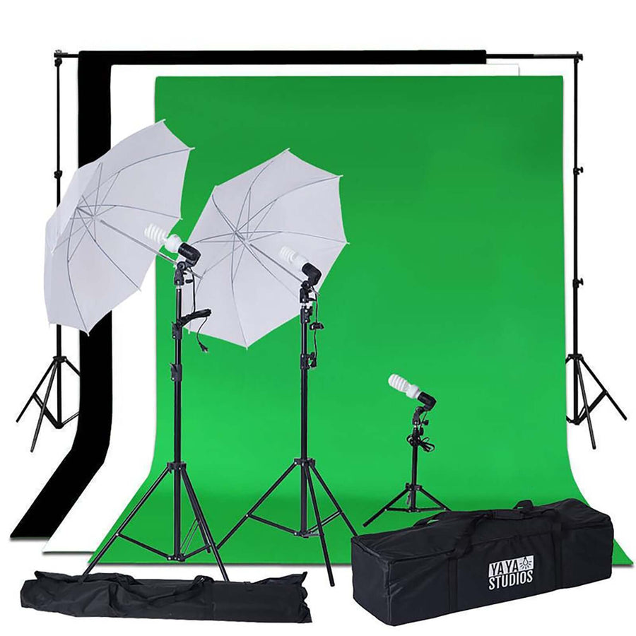 Photography lighting kit with green and black backdrops and umbrella softboxes