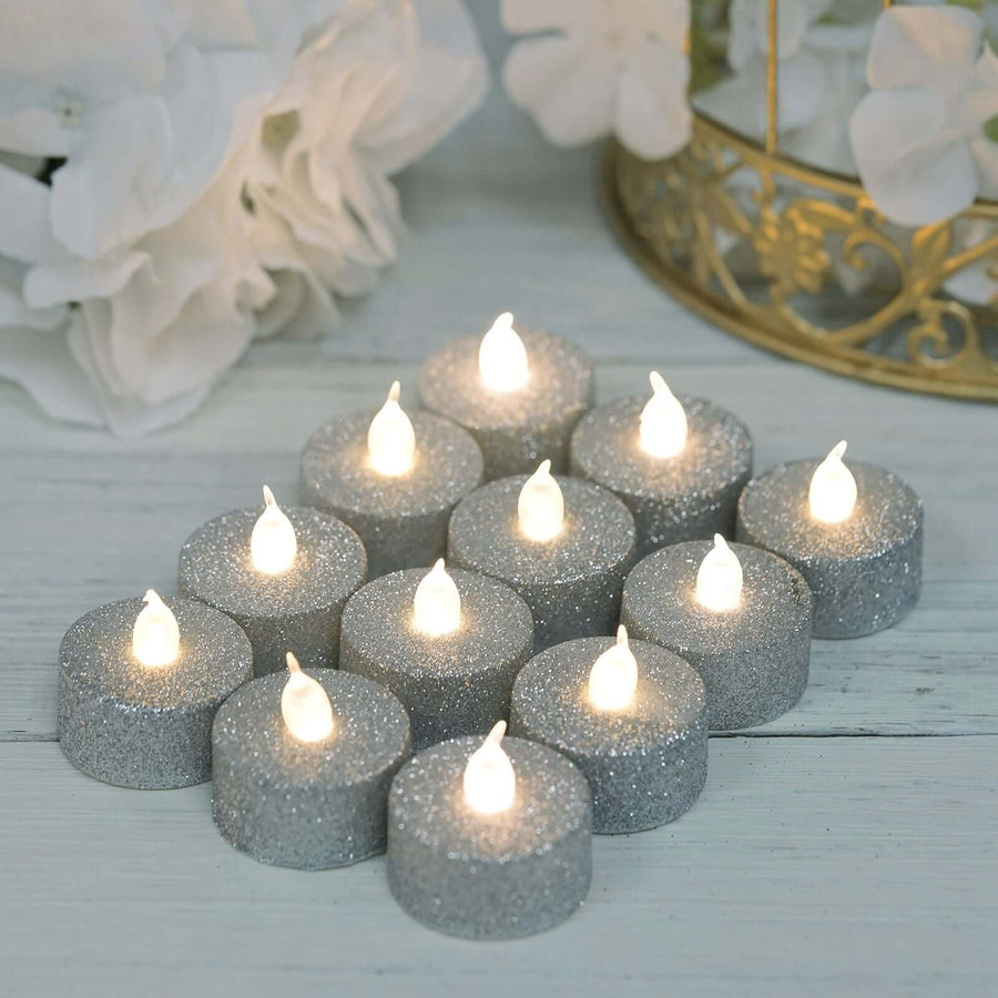 Silver glitter LED tea lights arranged in a decorative display.