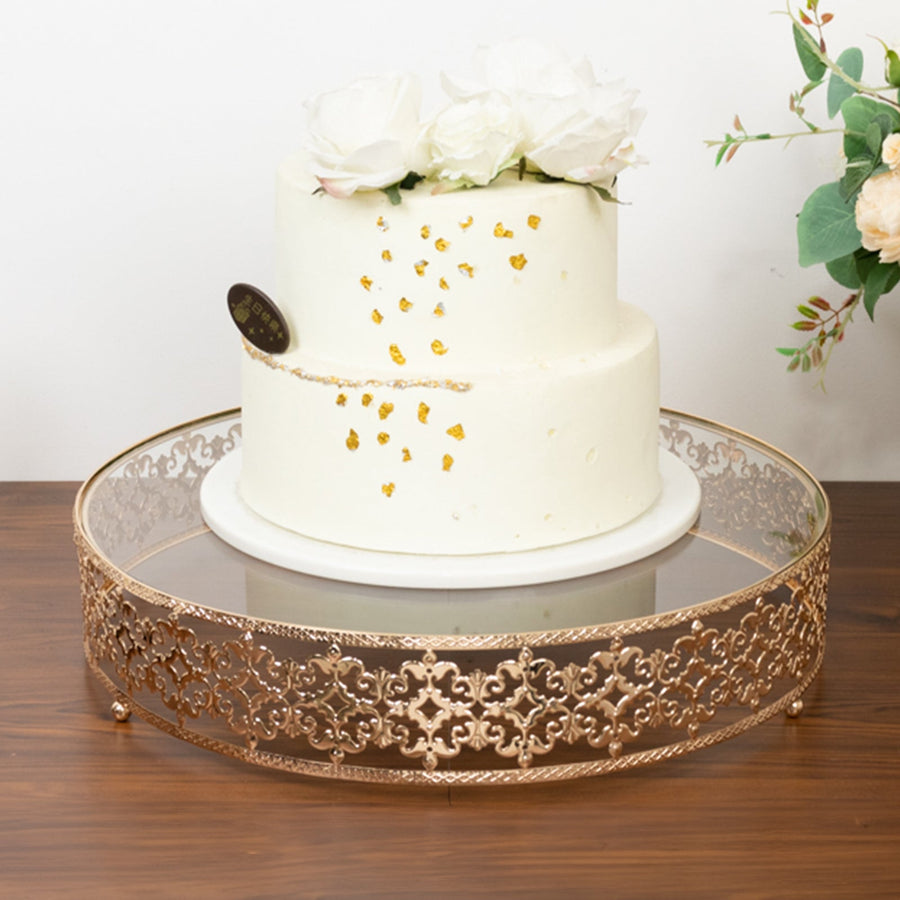 Elegant white cake with roses on a decorative gold cake stand.