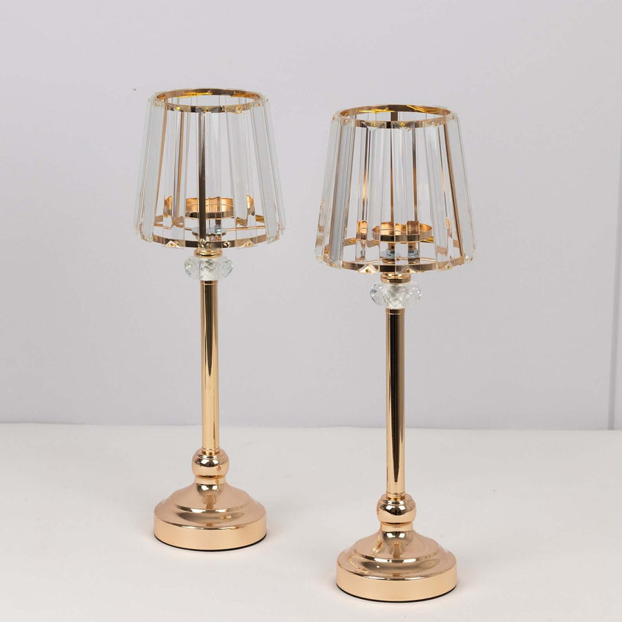 Elegant gold and crystal table lamps on a white background.