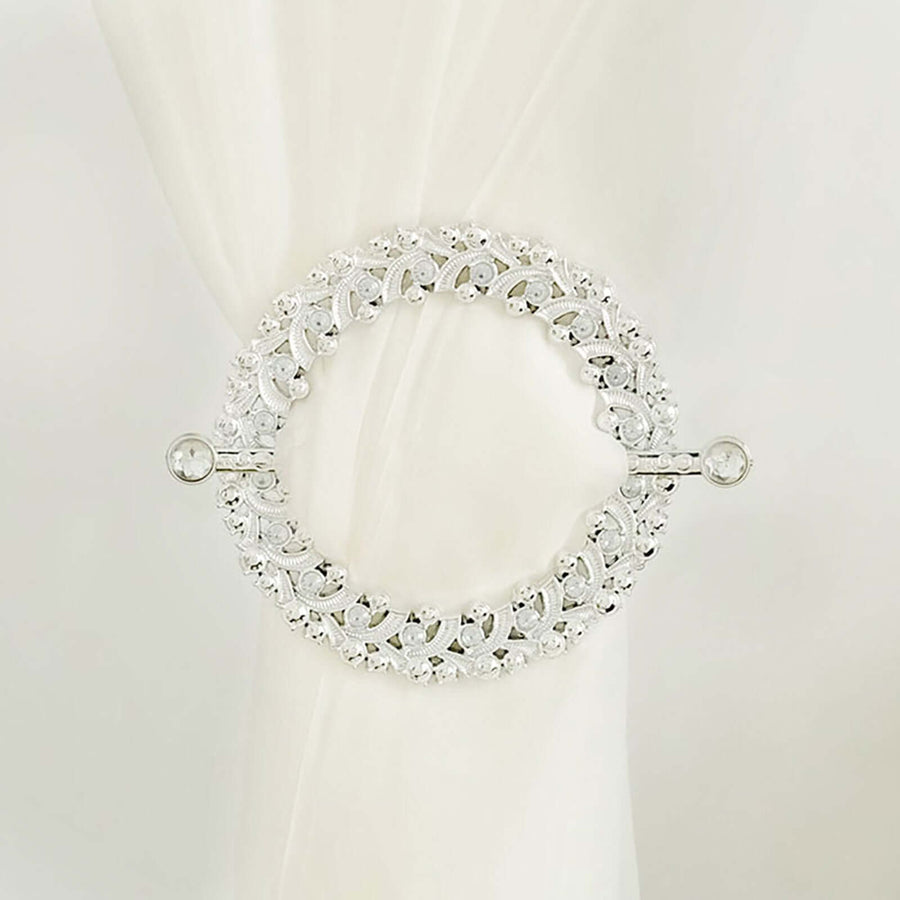 Elegant silver curtain ring with intricate design and crystal accents
