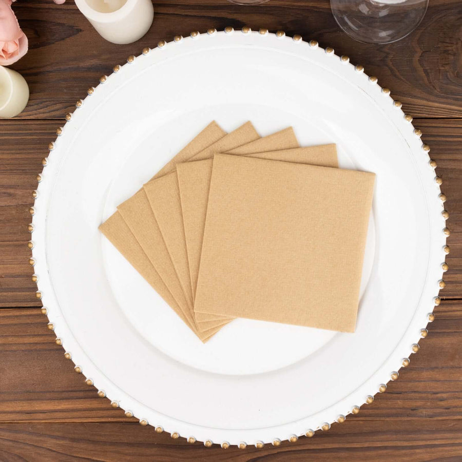 Set of five kraft paper coasters on a decorative white plate.