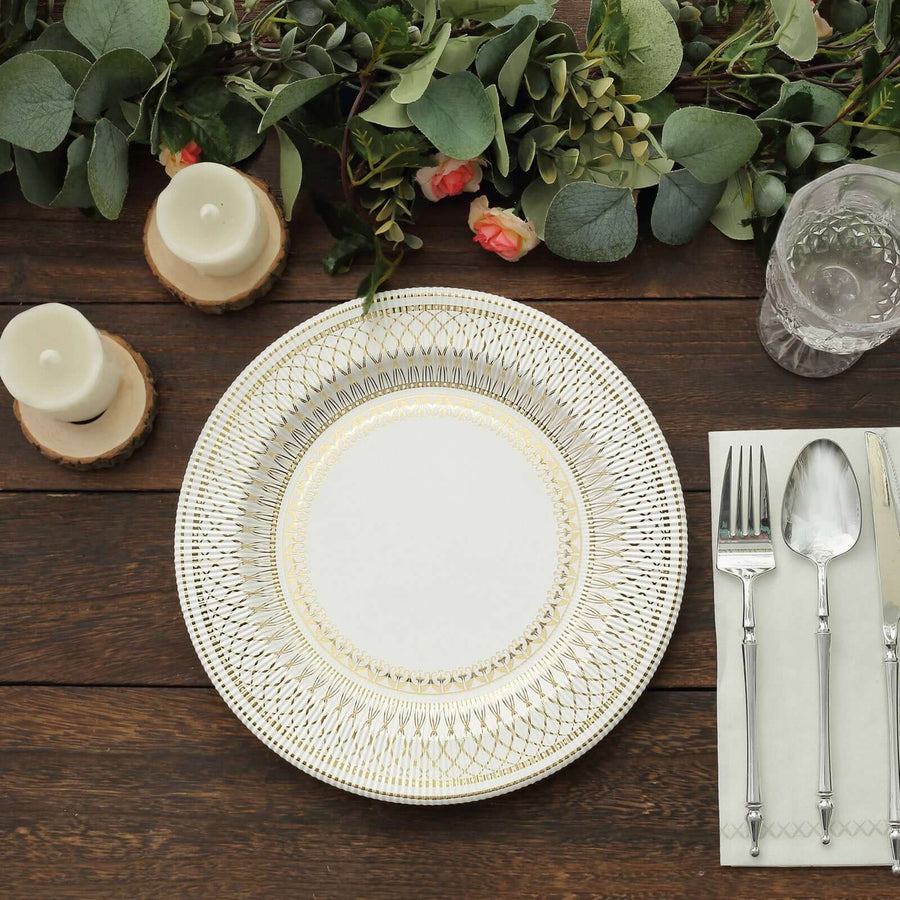 Elegant dinner plate with decorative rim set on a rustic wooden table.