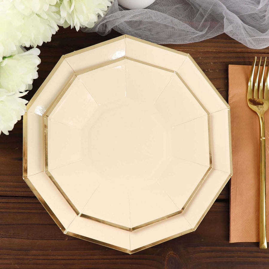 Elegant octagonal cream plate on a wooden table with floral accents.