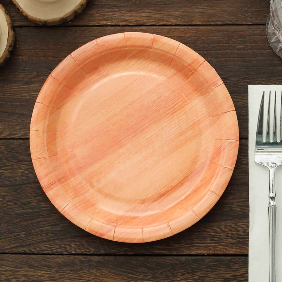 Biodegradable paper plate in a rustic wood finish on a table setting.