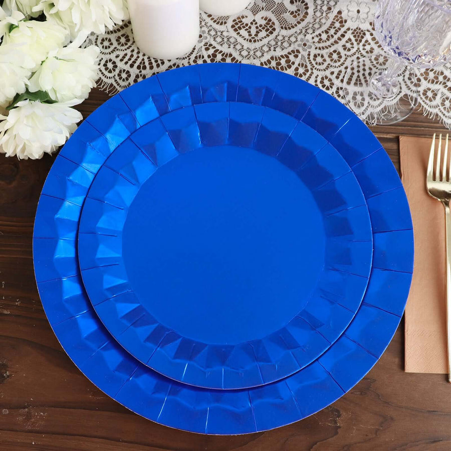 Blue paper plates stacked on a wooden table with decorative elements.