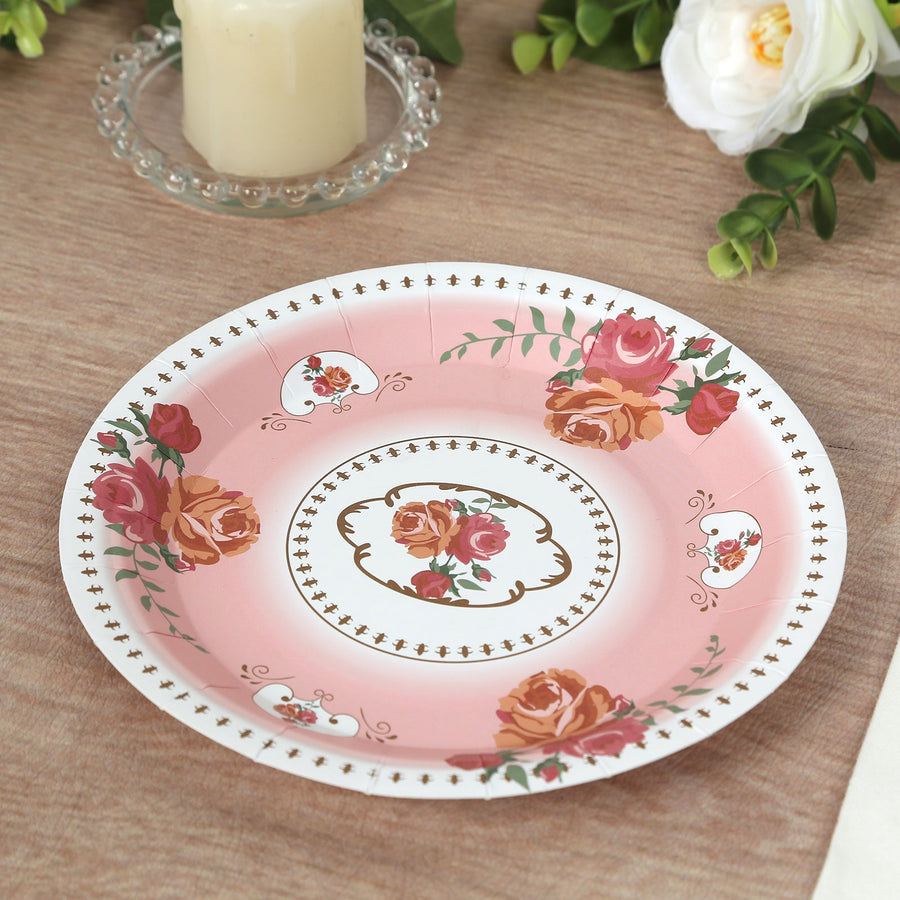 Floral design paper plate with pink background and decorative border.