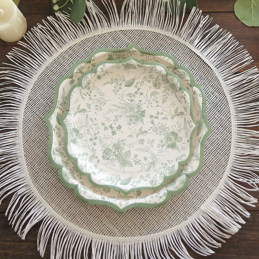 Decorative green and white floral serving trays on a fringed placemat.