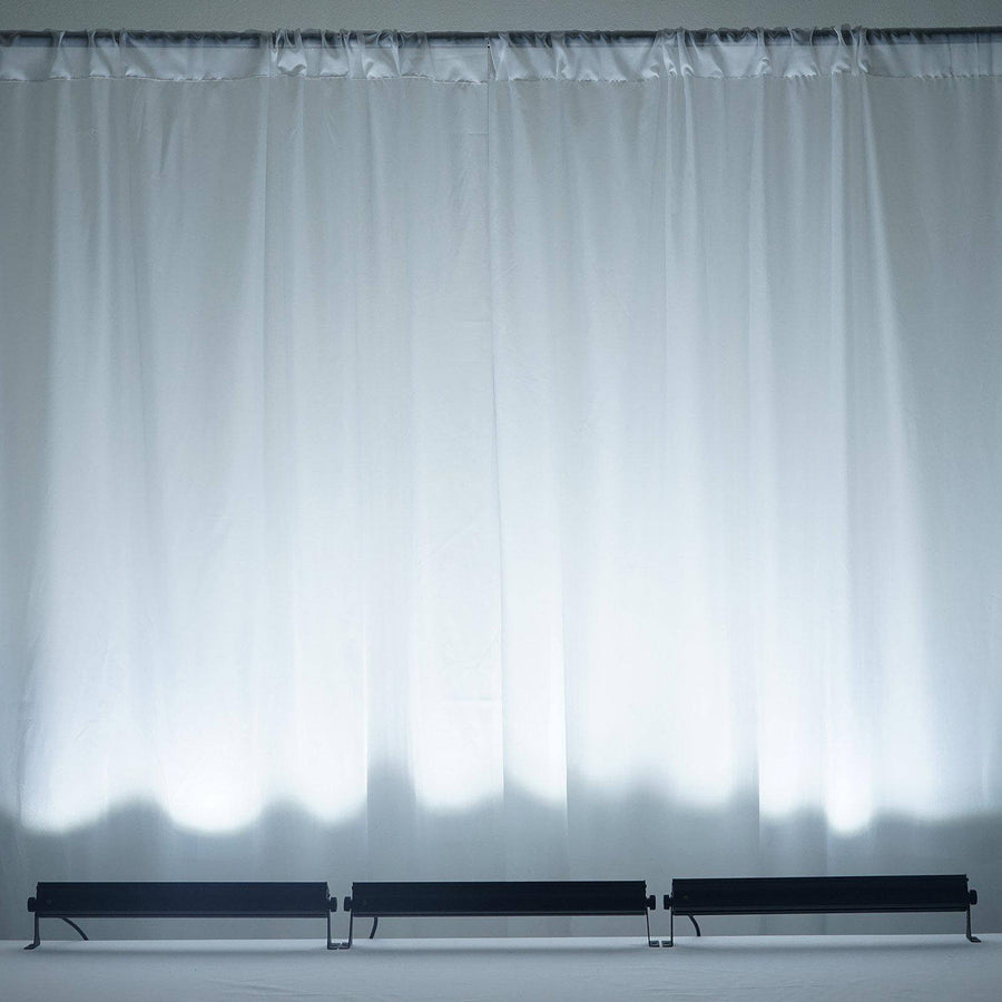 Three black decorative shelves against a plain white backdrop.