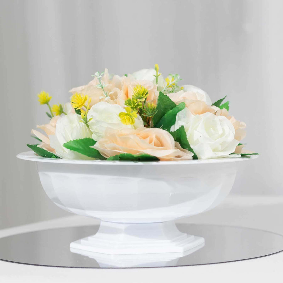 Artificial flower arrangement in a white decorative bowl.