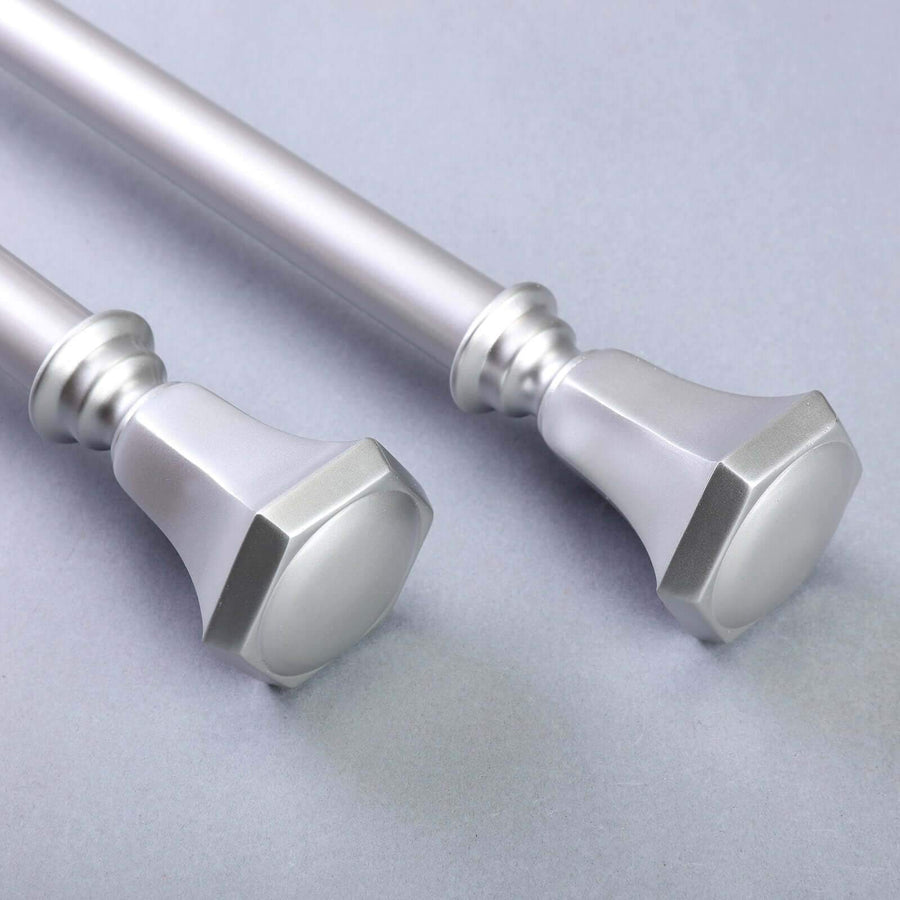 Silver curtain rod set with decorative end caps