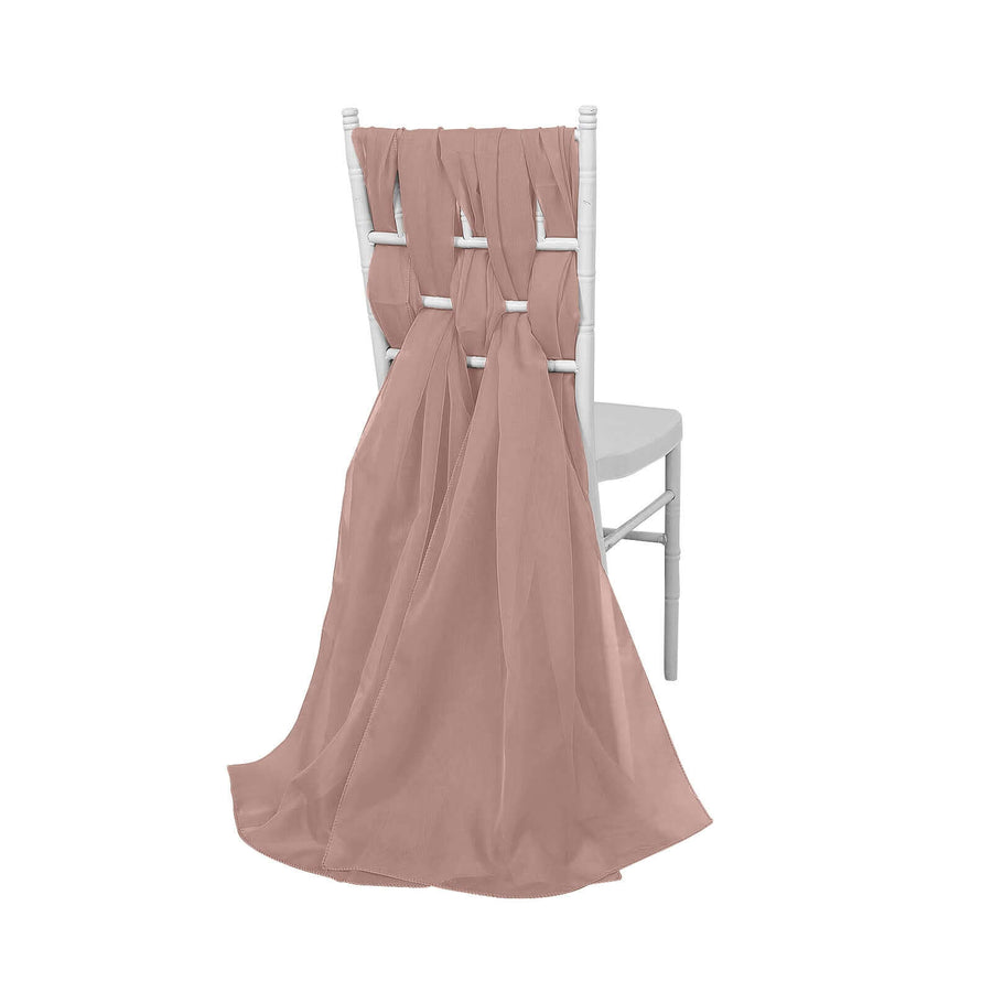 Blush pink chair sash draped on a white chiavari chair