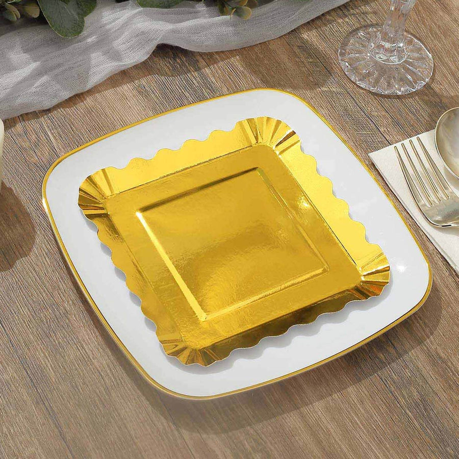 Gold square plate with elegant scalloped edges on a wooden table.