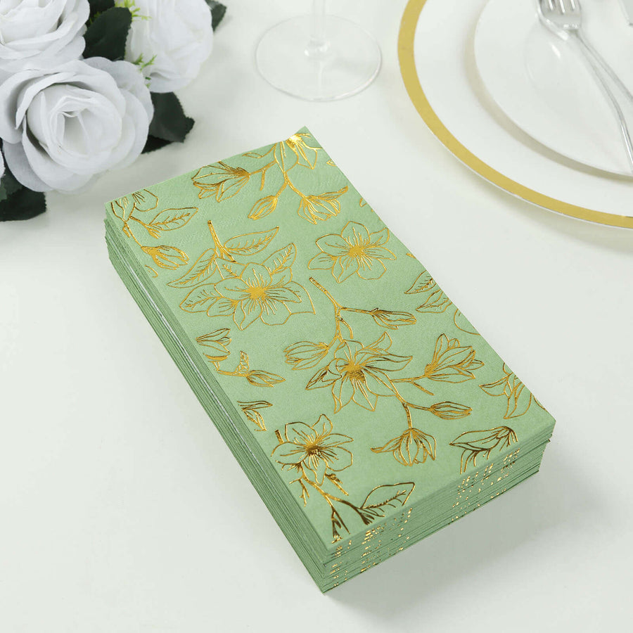Green floral napkins with gold accents on a white background.