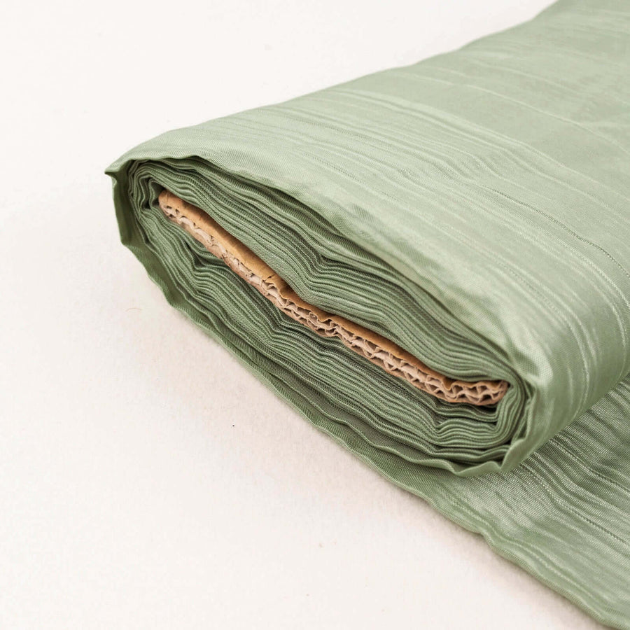 Rolled green fabric with textured surface.