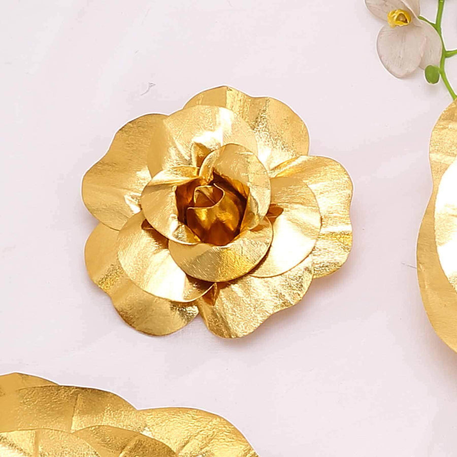 Gold flower decoration on a white background.