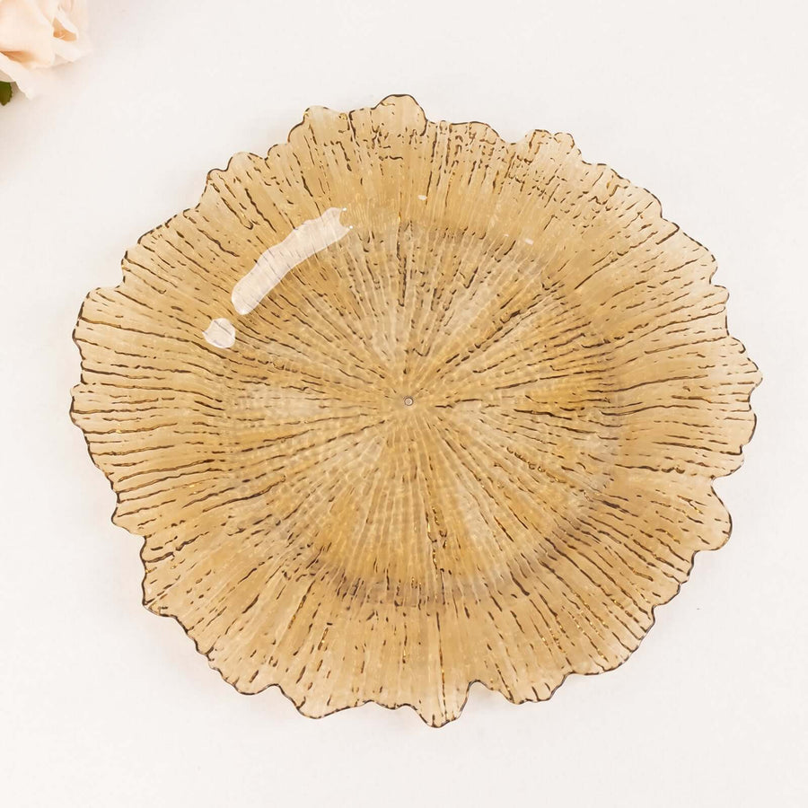 Decorative amber glass plate with textured floral design