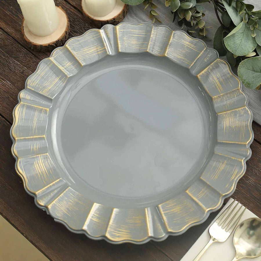 Gray decorative plate with gold accents on a wooden table.