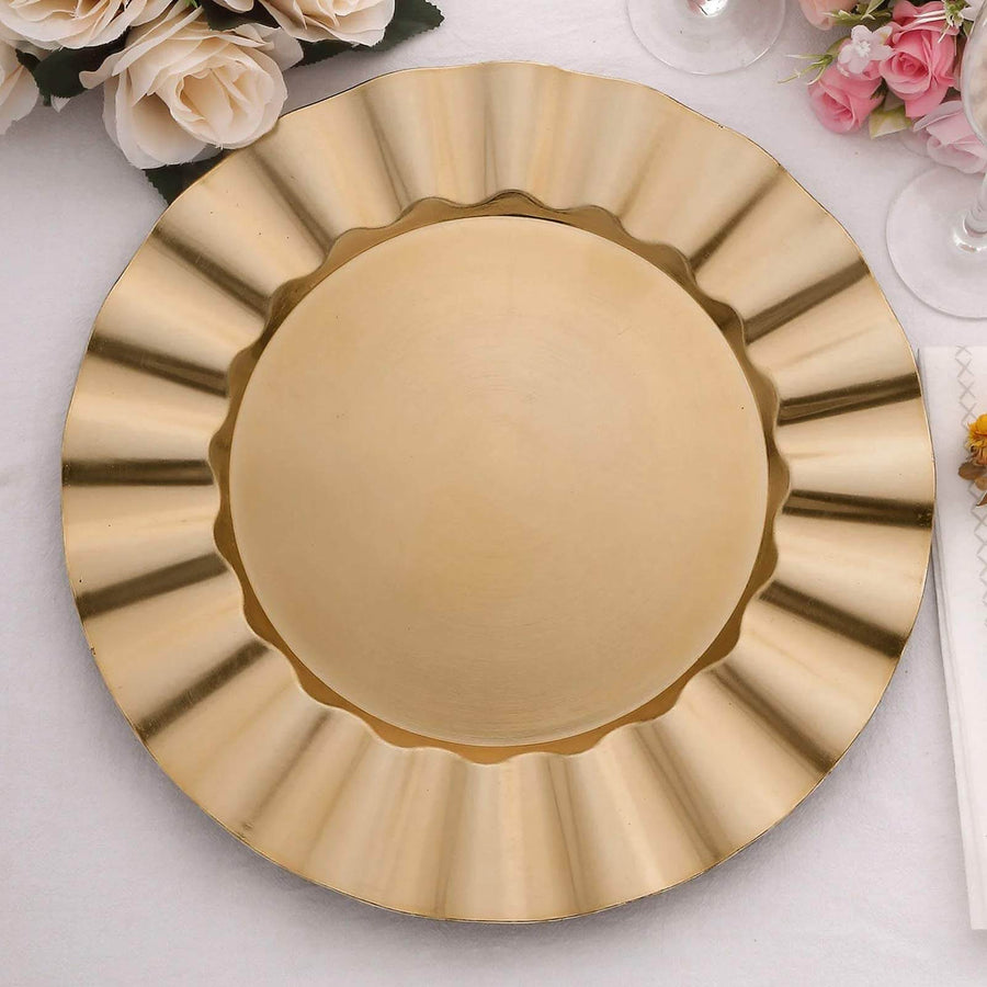 Gold decorative charger plate with a scalloped edge.