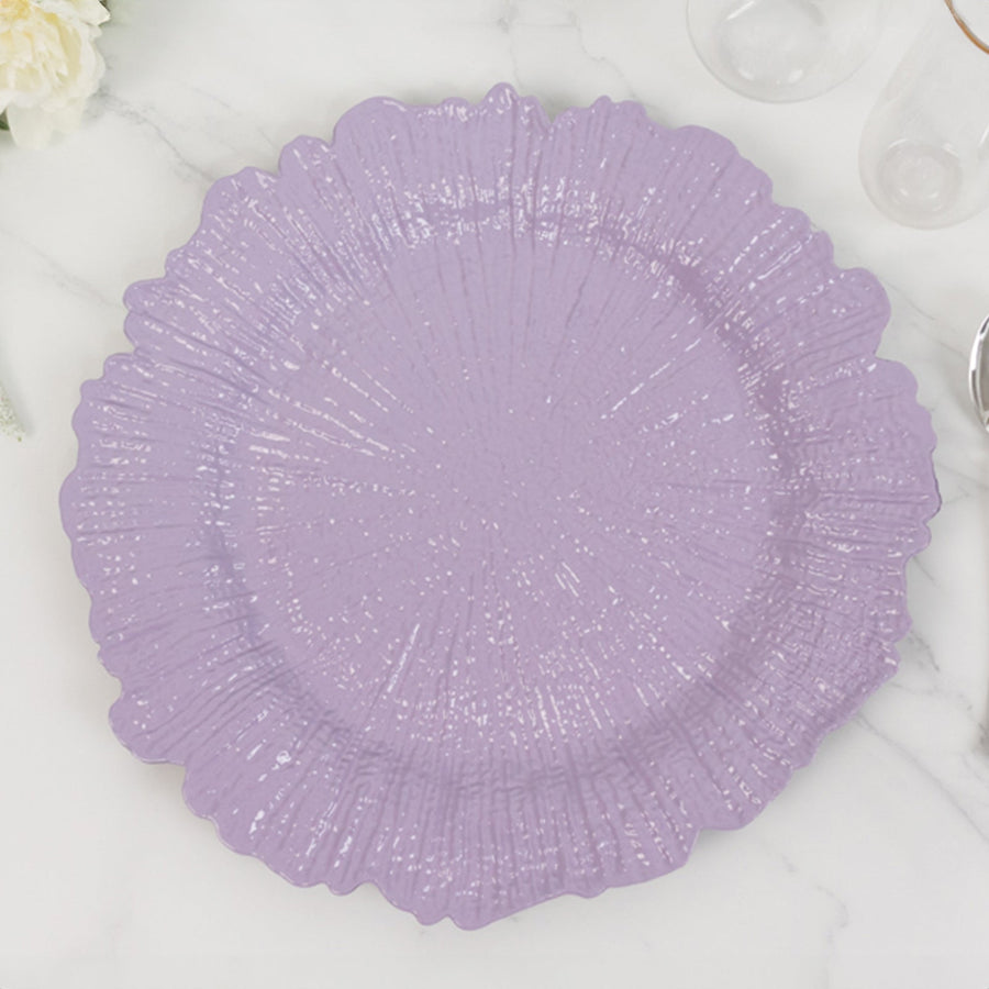 Purple textured serving plate on a marble surface.