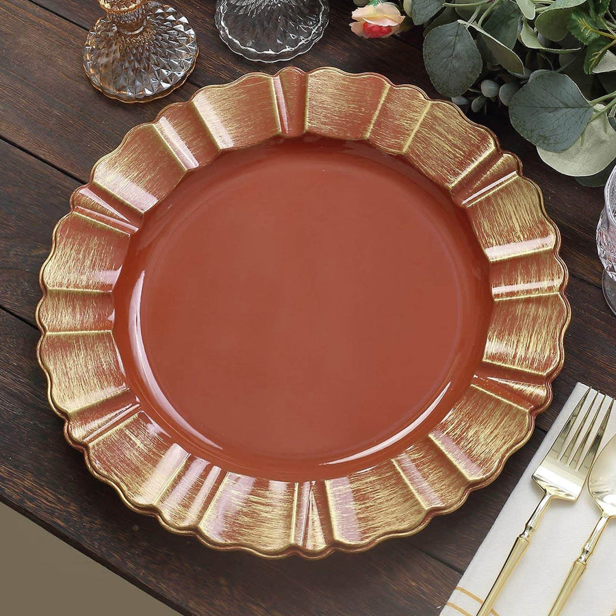 Elegant round plate with a gold scalloped edge on a wooden table.