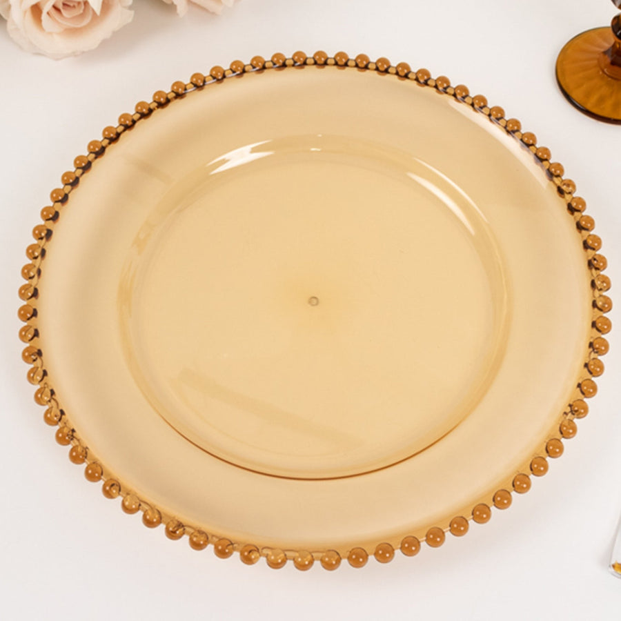 Elegant amber glass plate with decorative beaded edge