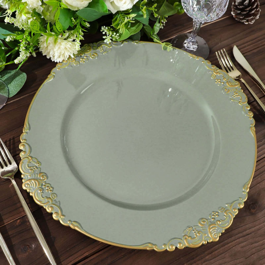 Elegant gray plate with gold rim on a wooden table setting.