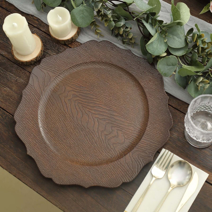 Wooden decorative charger plate on a rustic table setting.