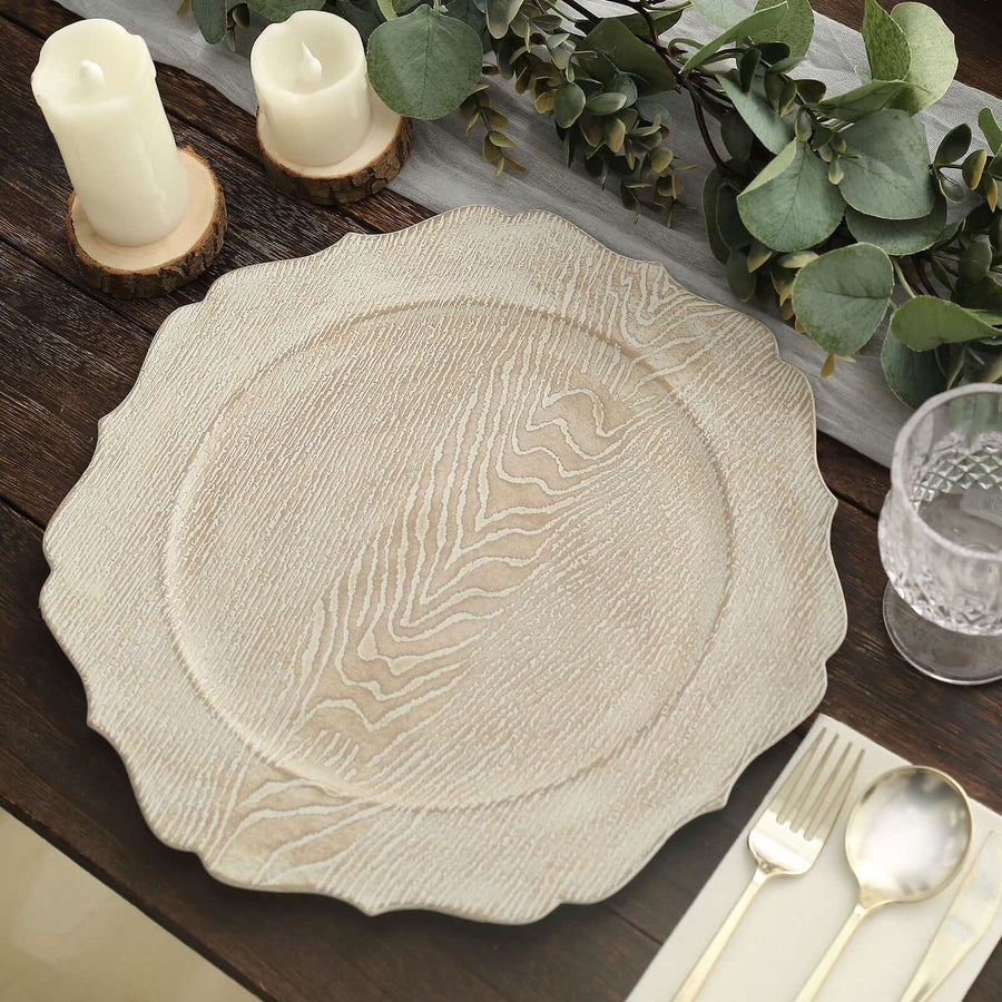 Decorative wooden charger plate on a rustic table setting.