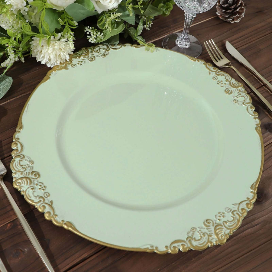 Elegant mint green charger plate with gold ornate detailing.