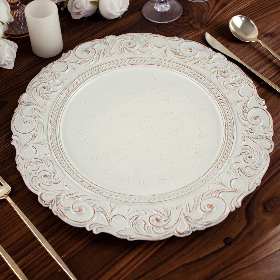 Decorative white serving platter with intricate golden detailing