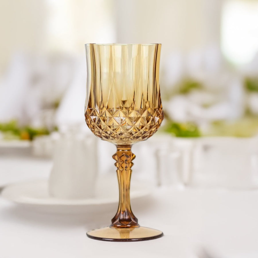 Amber crystal goblet on a dining table setting.