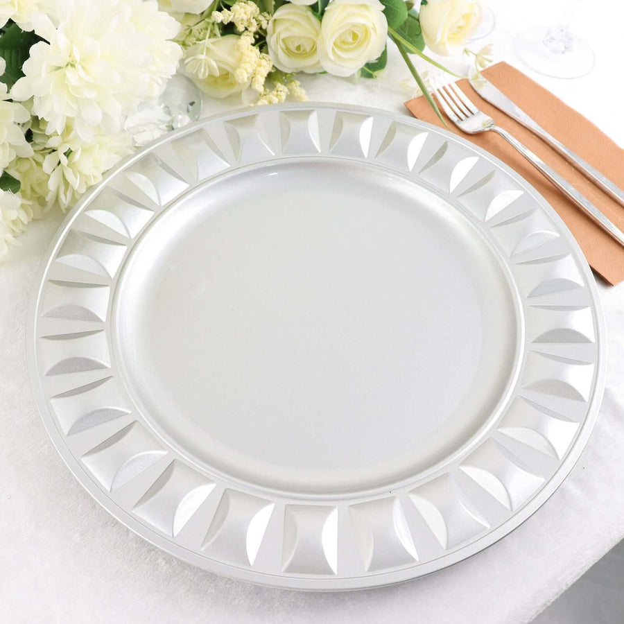 Elegant silver charger plate with decorative edge design