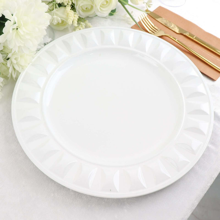 Elegant white serving plate with raised design, perfect for dining occasions.