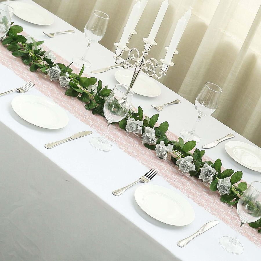 Elegant table setting with floral centerpiece, plates, and glassware.