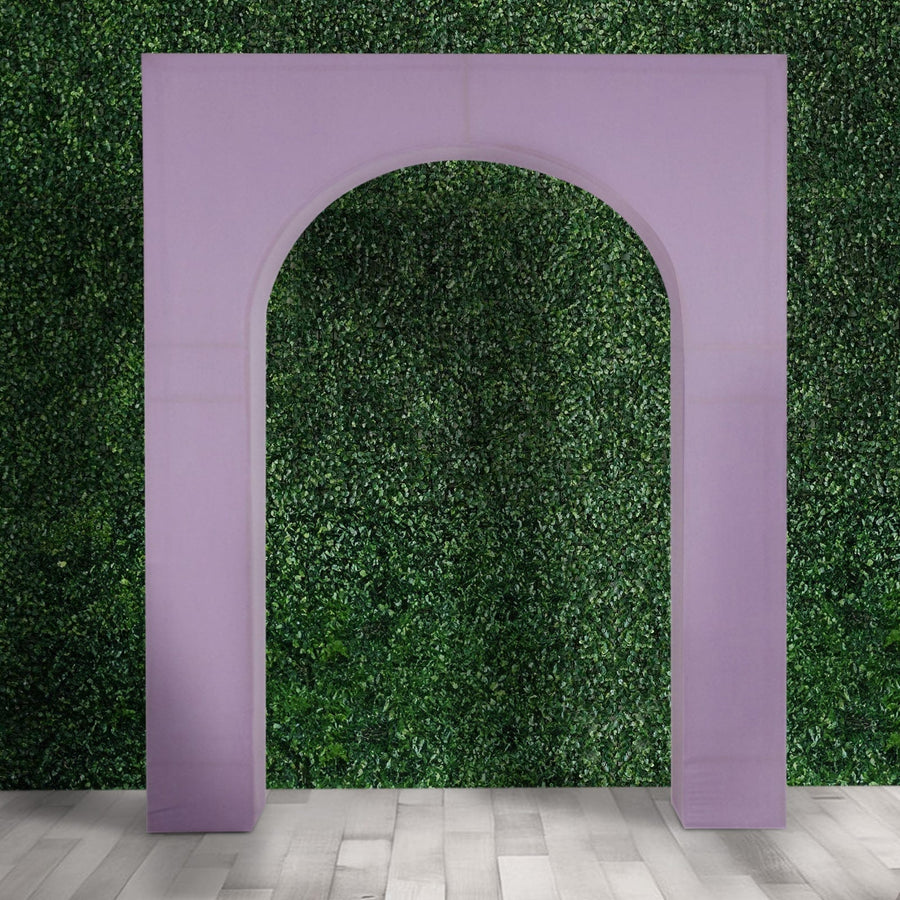 Purple arch decoration against a green foliage backdrop.