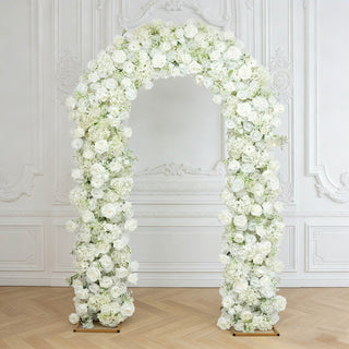White floral wedding arch with roses in elegant ornate room