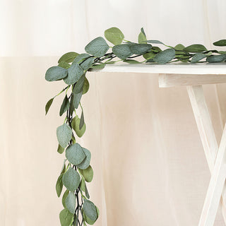 Create a Fresh and Inviting Atmosphere with the Frosted Green Artificial Silk Eucalyptus Leaf Garland Vine Create a Fresh and Inviting Atmosphere with the Frosted Green Artificial Silk Eucalyptus Leaf Garland Vine