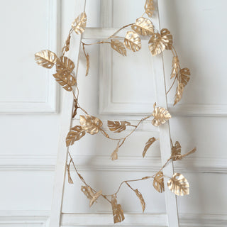 Add a Touch of Glamour with the Metallic Gold Artificial Monstera Leaf Hanging Vine Plant