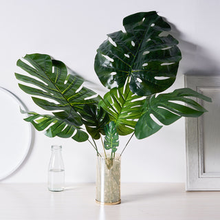 Add Vibrant Green to Your Décor with our Assorted Green Artificial Silk Tropical Monstera Leaf Plants Add Vibrant Green to Your Décor with our Assorted Green Artificial Silk Tropical Monstera Leaf Plants
