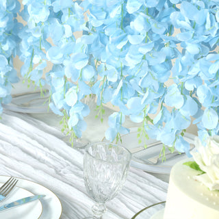 Blue artificial flowers arrangement for elegant table decor.