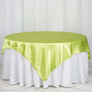Add a Touch of Elegance with the Apple Green Satin Square Tablecloth Overlay Add a Touch of Elegance with the Apple Green Satin Square Tablecloth Overlay